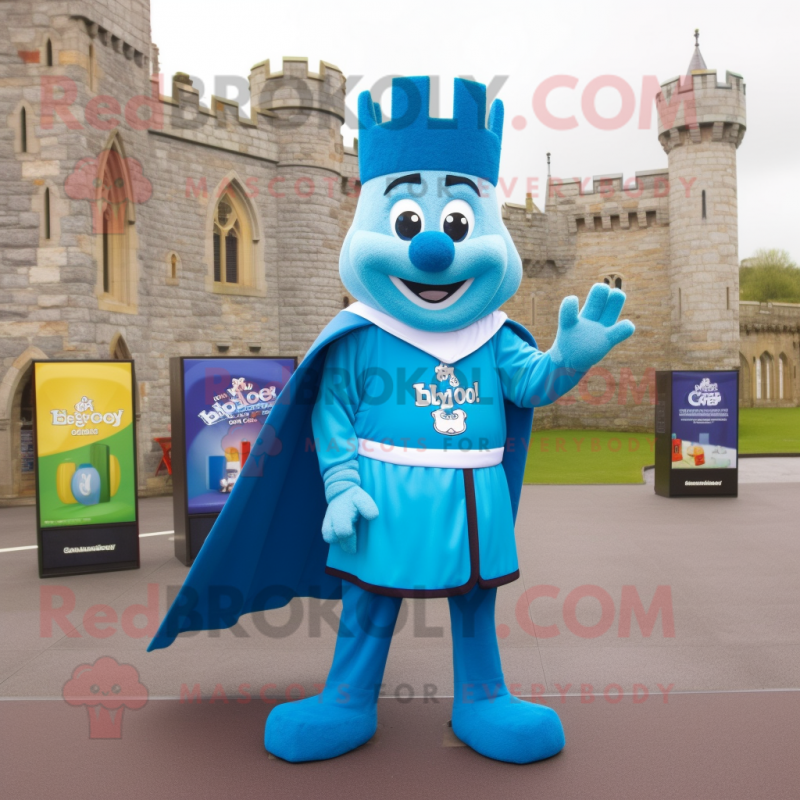Blue Irish Castle mascot costume character dressed with a T-Shirt and Shoe clips Blue Irish Castle mascot costume character dressed with a T-Shirt and Shoe clips