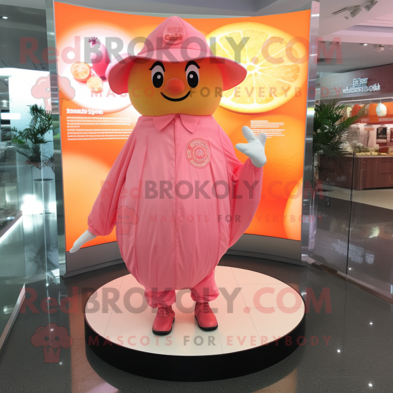 Pink Grapefruit mascot costume character dressed with a Cover-up and Cufflinks