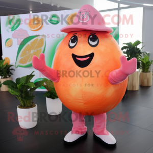 Pink Grapefruit mascot costume character dressed with a Cover-up and Cufflinks