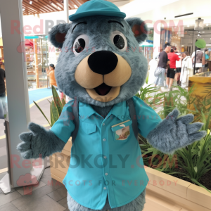 Turquoise Beaver mascot costume character dressed with a Chambray Shirt and Hairpins