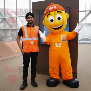 Orange Tikka Masala mascot costume character dressed with a Dungarees and Digital watches