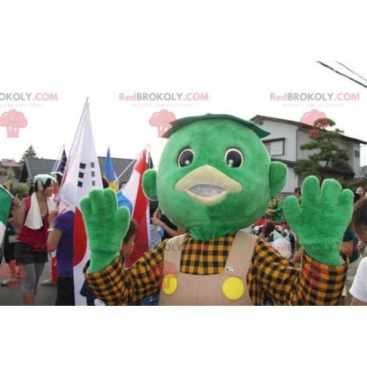 Mascote do boneco de neve verde com macacão e uma camisa -