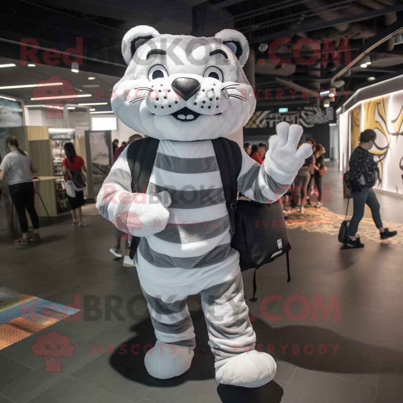 Silver Tiger mascot costume character dressed with a Bodysuit and Backpacks Silver Tiger mascot costume character dressed with a Bodysuit and Backpacks