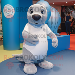 Gray Seal mascot costume character dressed with a Polo Tee and Foot pads
