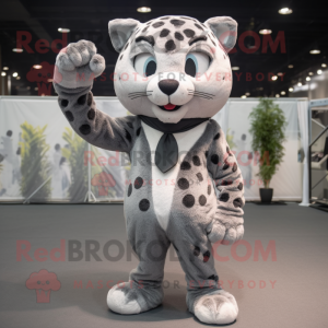 Gray Leopard mascot costume character dressed with a Suit Jacket and Headbands