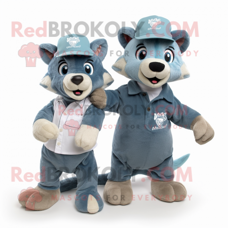 Teal Thylacosmilus mascot costume character dressed with a Boyfriend Jeans and Hat pins Teal Thylacosmilus mascot costume character dressed with a Boyfriend Jeans and Hat pins