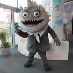 Gray Piranha mascot costume character dressed with a Suit Pants and Hair clips