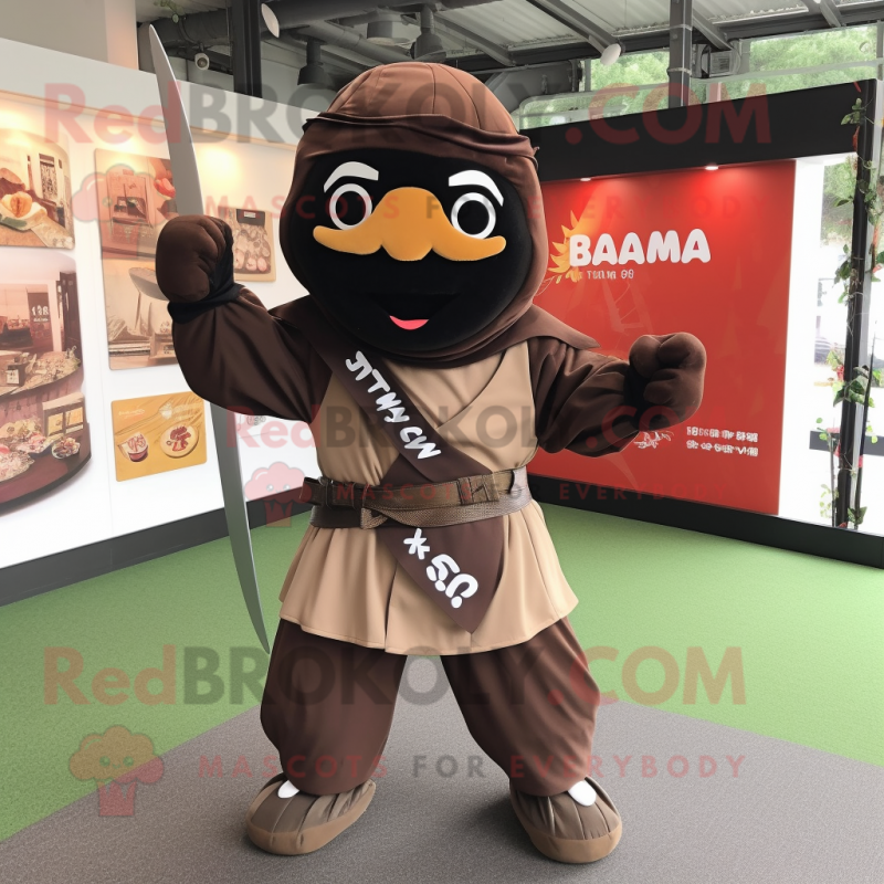 Brown Samurai mascot costume character dressed with a Trousers and Bow ties Brown Samurai mascot costume character dressed with a Trousers and Bow ties