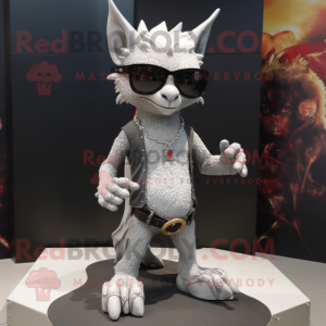 Silver Gargoyle mascot costume character dressed with a Bootcut Jeans and Sunglasses