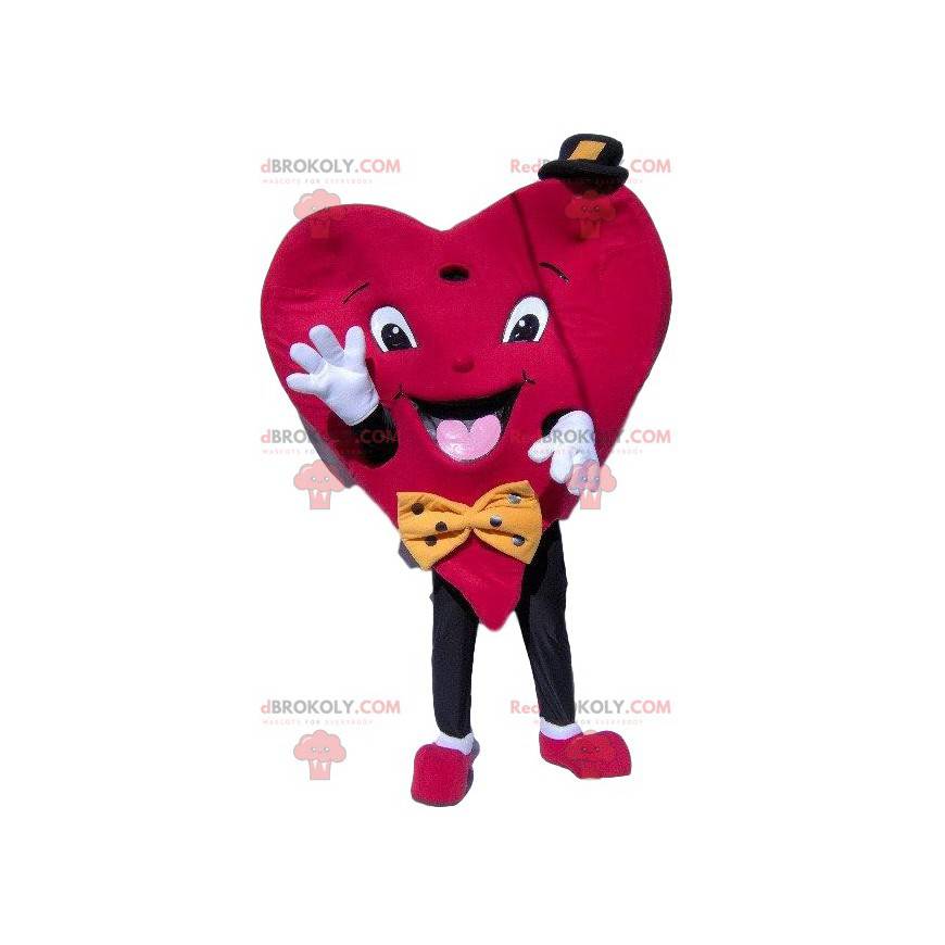 Mascotte del cuore con un cappellino e un papillon - Mascotte del cuore con un cappellino e un papillon -