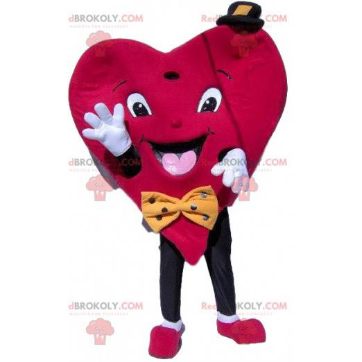 Hjerte maskot med en lille hat og en slips - Redbrokoly.com