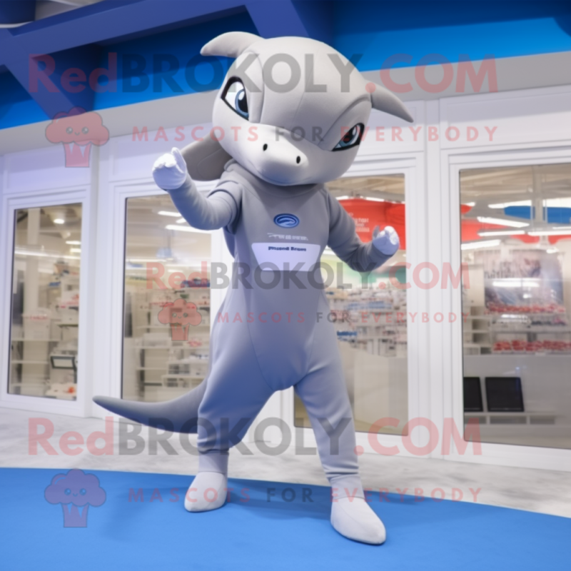 Silver Dolphin mascot costume character dressed with a One-Piece Swimsuit and Anklets Silver Dolphin mascot costume character dressed with a One-Piece Swimsuit and Anklets