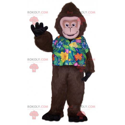 Affenmaskottchen mit einem tropischen Hemd. Affenkostüm -