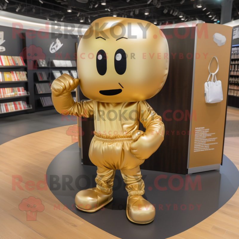 Gold Boxing Glove mascot costume character dressed with a Shorts and Messenger bags Gold Boxing Glove mascot costume character dressed with a Shorts and Messenger bags