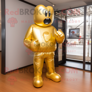 Gold Boxing Glove mascot costume character dressed with a Shorts and Messenger bags