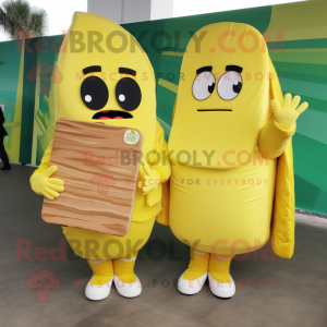 Lemon Yellow Enchiladas mascot costume character dressed with a Parka and Wallets