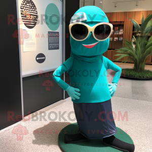 Teal Pendant mascot costume character dressed with a Sheath Dress and Sunglasses