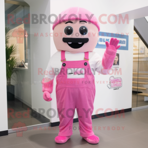 Pink Falafel mascot costume character dressed with a Overalls and Beanies