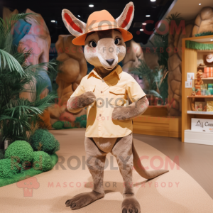 Peach Kangaroo mascot costume character dressed with a Chinos and Hats