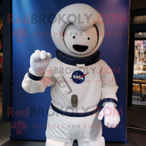 Navy Astronaut mascot costume character dressed with a Poplin Shirt and Wraps