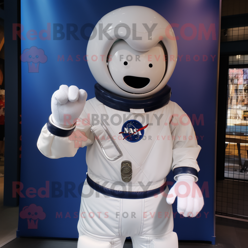 Navy Astronaut mascot costume character dressed with a Poplin Shirt and Wraps