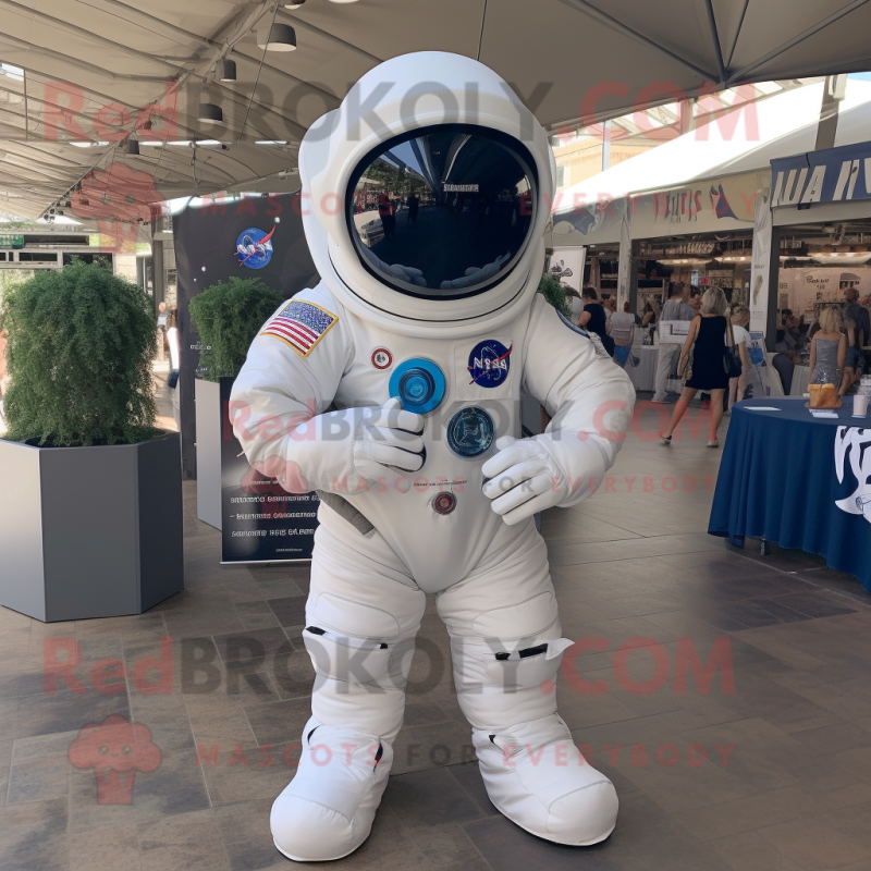 Navy Astronaut mascot costume character dressed with a Poplin Shirt and Wraps