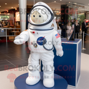 Navy Astronaut mascot costume character dressed with a Poplin Shirt and Wraps