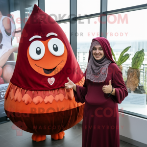 Maroon Shakshuka mascot costume character dressed with a Blouse and Beanies