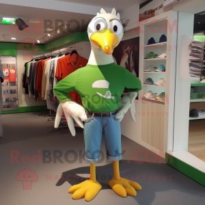 Green Albatross mascot costume character dressed with a Flare Jeans and Cummerbunds