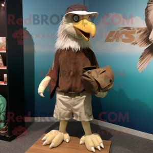 Beige Haast'S Eagle mascot costume character dressed with a Board Shorts and Hats