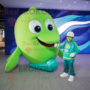 Lime Green Blue Whale mascot costume character dressed with a T-Shirt and Digital watches