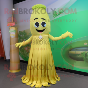 Gold Celery mascot costume character dressed with a Circle Skirt and Hair clips