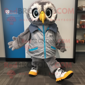 Gray Owl mascot costume character dressed with a Windbreaker and Shoe laces