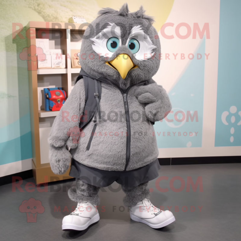 Gray Owl mascot costume character dressed with a Windbreaker and Shoe laces