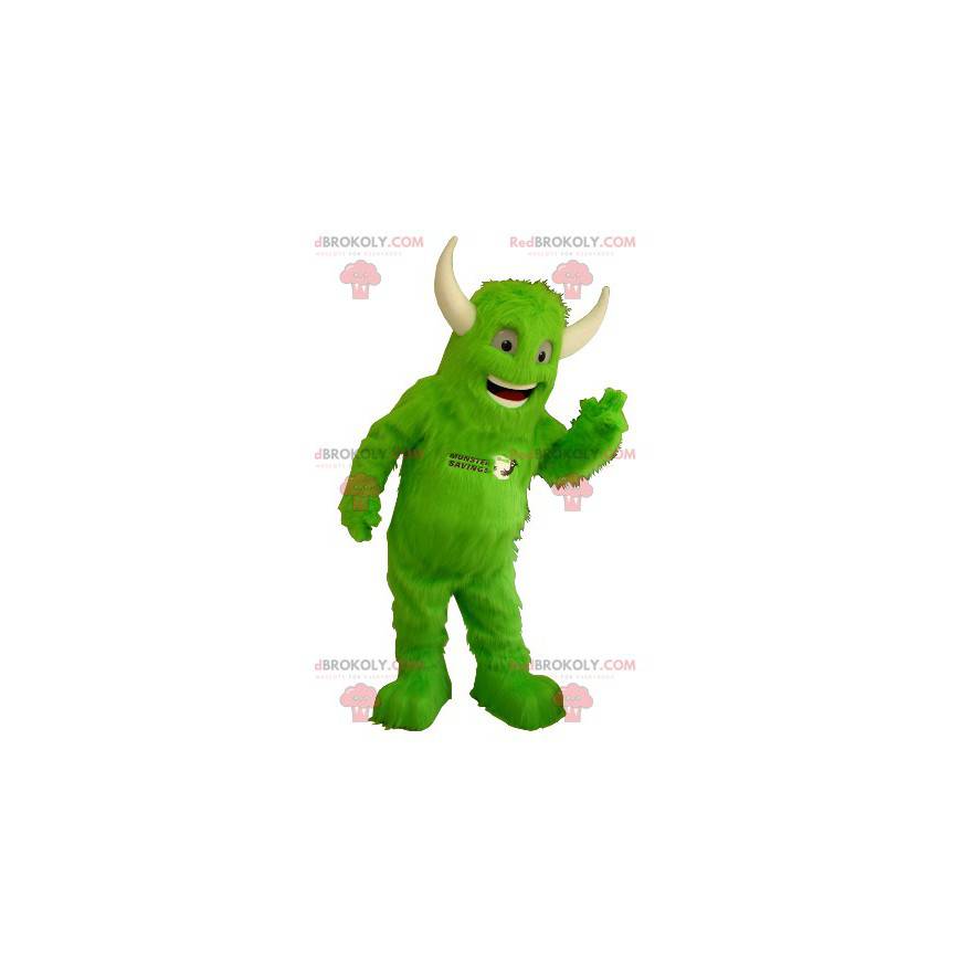 Mascotte de monstre vert tout poilu avec des cornes -