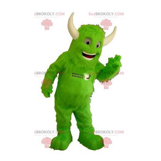 Mascotte de monstre vert tout poilu avec des cornes -