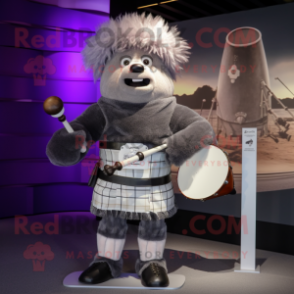 Gray Bagpipe mascot costume character dressed with a Graphic Tee and Cufflinks