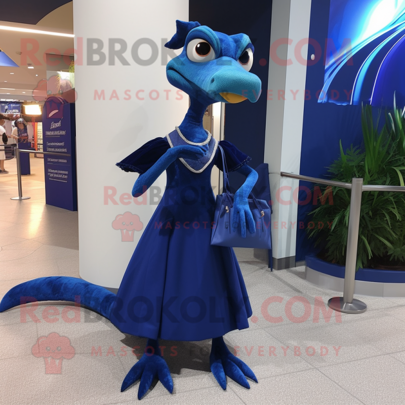 Navy Coelophysis mascot costume character dressed with a Evening Gown and Messenger bags