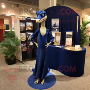 Navy Coelophysis mascot costume character dressed with a Evening Gown and Messenger bags