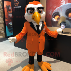 Orange Falcon mascot costume character dressed with a Suit Jacket and Headbands