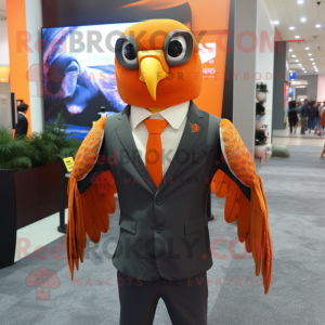 Orange Falcon mascot costume character dressed with a Suit Jacket and Headbands