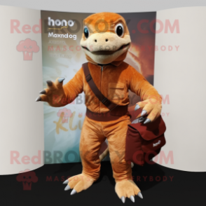 Rust Komodo Dragon mascot costume character dressed with a Romper and Messenger bags