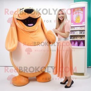 Peach Walrus mascot costume character dressed with a Wrap Skirt and Headbands