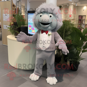 Gray Raspberry mascot costume character dressed with a Suit Pants and Anklets