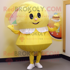 Lemon Yellow Cupcake mascot costume character dressed with a Capri Pants and Shawl pins