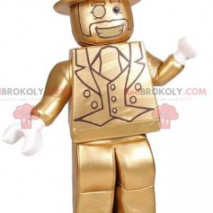 Mascote Playmobil de um homem em uma fantasia dourada -