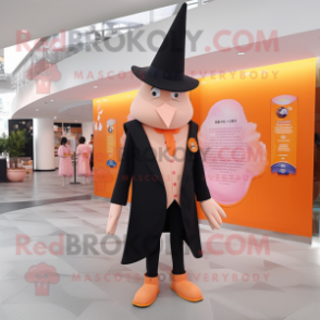 Peach Witch'S Hat mascot costume character dressed with a Suit Pants and Cufflinks