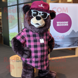 Magenta Spectacled Bear mascot costume character dressed with a Flannel Shirt and Hat pins