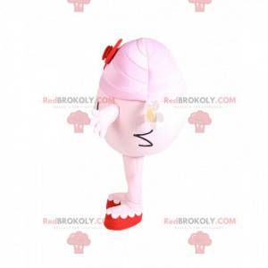 Mascot little girl round and pink with a red bow -
