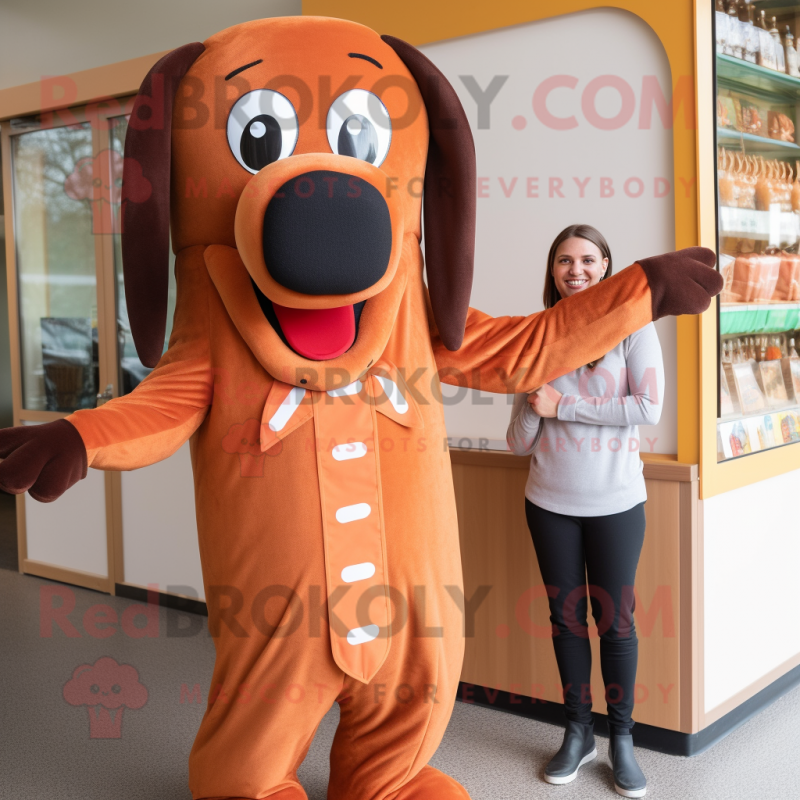 Rust Hot Dog mascot costume character dressed with a Sweatshirt and Bow ties Rust Hot Dog mascot costume character dressed with a Sweatshirt and Bow ties